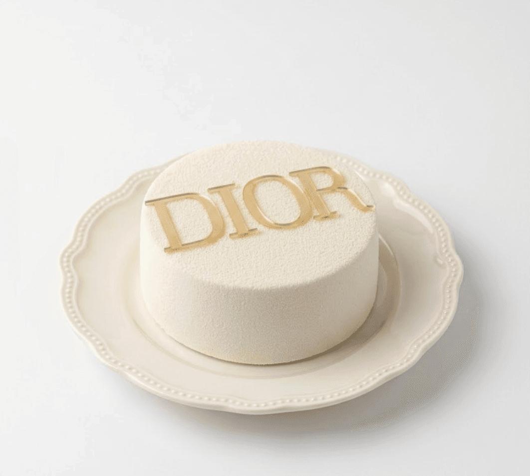 White elegant bento cake with gold lettering — luxury design